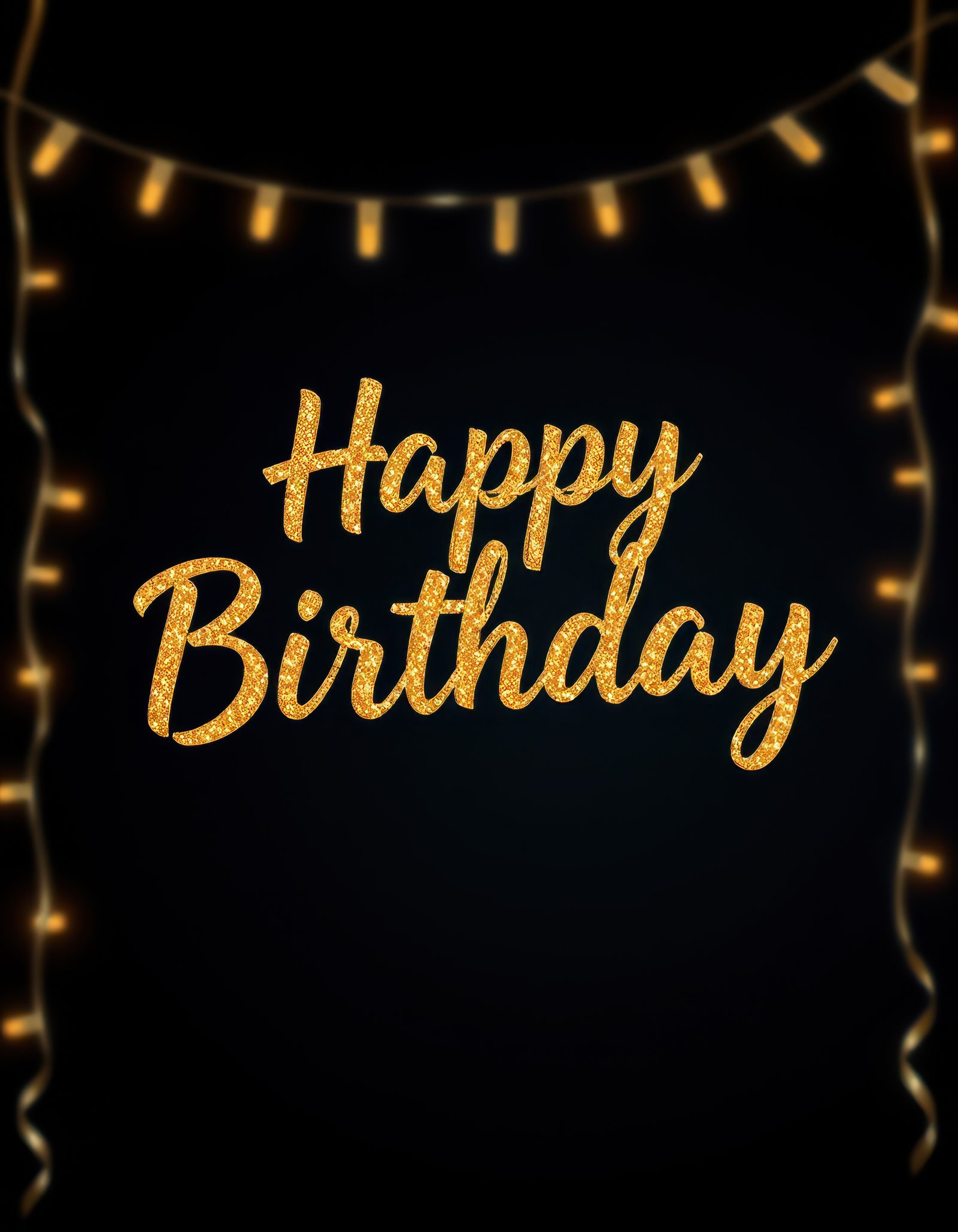 Creative birthday decoration with sparkling golden lettering and fairy lights against a dark background